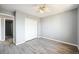 A simple bedroom with carpeted floors and neutral walls at 3089 S Quintero Way, Aurora, CO 80013