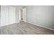 A simple bedroom with carpeted floors and neutral walls at 3089 S Quintero Way, Aurora, CO 80013