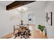 Dining area features modern table and chairs, decorative lighting, and stylish decor at 1557 S Owens St # 59, Denver, CO 80232
