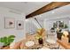 Open concept dining and living space with modern decor and a view of the neighborhood at 1557 S Owens St # 59, Denver, CO 80232
