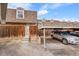 A well-maintained exterior featuring a carport, with easy access to the front entrance at 1557 S Owens St # 59, Denver, CO 80232