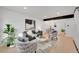 Bright living room featuring stylish furniture, modern decor, and an open floor plan at 1557 S Owens St # 59, Denver, CO 80232