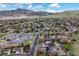 Expansive aerial view of neighborhood with mountains in the background, featuring well-maintained streets at 2194 S Braun Way, Lakewood, CO 80228