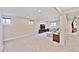 Spacious finished basement features neutral carpet, recessed lighting, and comfortable seating area at 2194 S Braun Way, Lakewood, CO 80228