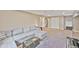 Finished basement boasts plush carpeting, sectional sofa, and ample room for entertaining at 2194 S Braun Way, Lakewood, CO 80228