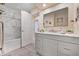 An updated bathroom boasting marble accents, a sleek vanity, and modern fixtures creating a spa-like atmosphere at 2194 S Braun Way, Lakewood, CO 80228