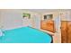 A cozy bedroom featuring a plush bed, ample closet space, and an ensuite bathroom, offering comfort and convenience at 2194 S Braun Way, Lakewood, CO 80228