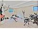 Finished basement exercise room with weight-lifting and cardio equipment at 2194 S Braun Way, Lakewood, CO 80228