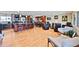 Spacious living room with hardwood floors, opening up to a beautifully renovated open kitchen at 2194 S Braun Way, Lakewood, CO 80228