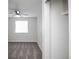 Bedroom with window and walk-in closet at 3423 W Walsh Pl, Denver, CO 80219