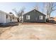 Charming single-Gathering home with a large driveway and easy access to the front door at 3423 W Walsh Pl, Denver, CO 80219