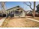This charming single-Gathering home boasts a covered front porch and a well-maintained yard at 3423 W Walsh Pl, Denver, CO 80219
