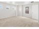 Bedroom with carpet, recessed lights, and multiple windows at 553 Homestead Ave, Brighton, CO 80601