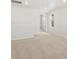 Large carpeted bedroom with recessed lighting and window for natural light at 553 Homestead Ave, Brighton, CO 80601