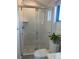 Bathroom featuring glass enclosed shower, toilet, and accent plant at 1690 Spruce St, Denver, CO 80220