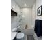 Bathroom features tub, shower, toilet, and contemporary decor at 1690 Spruce St, Denver, CO 80220