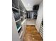 Walk-in closet with custom shelving, drawers, and hanging rods to keep wardrobe items organized and accessible at 1690 Spruce St, Denver, CO 80220