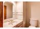 Standard bathroom with neutral tones and classic fixtures providing a clean and functional space at 11682 E Iowa Ave, Aurora, CO 80012