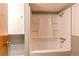 Bathroom featuring a white bathtub and shower at 11682 E Iowa Ave, Aurora, CO 80012