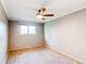 Bright bedroom with natural light and a ceiling fan at 11682 E Iowa Ave, Aurora, CO 80012
