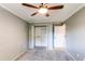 Bedroom featuring an open closet with shelving at 11682 E Iowa Ave, Aurora, CO 80012