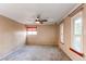 Bedroom with three windows and a ceiling fan at 11682 E Iowa Ave, Aurora, CO 80012