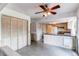 Kitchen with white cabinets and modern appliances at 11682 E Iowa Ave, Aurora, CO 80012