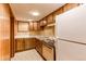Kitchenette with countertops and a refrigerator at 11682 E Iowa Ave, Aurora, CO 80012