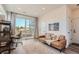 Bright bedroom with a modern-styled workstation, light wood floors, and plenty of natural light at 2446 W 167Th Ln, Broomfield, CO 80023