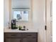 Chic coffee bar area with built-in countertop, drawers, and a modern coffee maker, perfect for a morning pick-me-up at 2446 W 167Th Ln, Broomfield, CO 80023