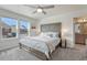 Bedroom featuring ceiling fan and two windows at 28428 E 8Th Pl, Watkins, CO 80137
