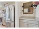 Bright kitchen featuring stainless steel refrigerator and granite counters at 28428 E 8Th Pl, Watkins, CO 80137