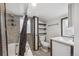 Charming bathroom showcasing unique tile and modern fixtures, offering a stylish and functional space at 530 S Quitman St, Denver, CO 80219