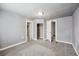 Bright bedroom with multiple doorways and ample space, perfect for comfortable living at 530 S Quitman St, Denver, CO 80219