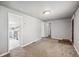 Open living room with access to updated kitchen with stainless steel appliances at 530 S Quitman St, Denver, CO 80219