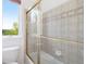 Bathroom showcases glass shower doors and a window with a view at 5924 S Kittredge St, Centennial, CO 80016