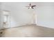 Bedroom features a vaulted ceiling and exterior access to porch at 5924 S Kittredge St, Centennial, CO 80016