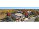 Beautiful home with mature landscaping, a three-car garage, and a charming front porch at 5924 S Kittredge St, Centennial, CO 80016
