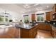 Bright and spacious kitchen with a large island, ample cabinetry, and modern appliances at 5924 S Kittredge St, Centennial, CO 80016