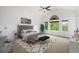 Serene main bedroom with vaulted ceilings, large windows, and a neutral color palette at 5924 S Kittredge St, Centennial, CO 80016