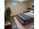 Comfortable bedroom featuring a cozy bed, a large window, and a relaxing ambiance at 1796 S Yampa Way, Aurora, CO 80017