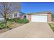 Charming single-Gathering home with a well-maintained lawn, brick accents, and an attached two-car garage at 1796 S Yampa Way, Aurora, CO 80017