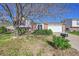 Charming single-Gathering home with a well-maintained lawn, brick accents, and an attached two-car garage at 1796 S Yampa Way, Aurora, CO 80017