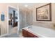 Bathroom with soaking tub and walk-in shower at 9290 Melborne Ct, Parker, CO 80134
