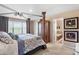 Beautiful bedroom with canopy bed, closet and bathroom access at 9290 Melborne Ct, Parker, CO 80134