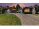Stunning single-Gathering home with black trim, attached garage, and well-manicured lawn at 2140 Tabor Dr, Lakewood, CO 80215