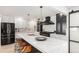 This spacious kitchen boasts modern appliances, an island, and ample counter space at 2140 Tabor Dr, Lakewood, CO 80215
