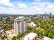 Stunning high-rise condo building with city views and vibrant green space at 400 E 3Rd Ave # 305, Denver, CO 80203