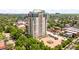Beautiful aerial view of a high-rise building with lush green trees around it at 400 E 3Rd Ave # 305, Denver, CO 80203