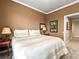 Comfortable bedroom with carpet flooring and a private ensuite entrance at 400 E 3Rd Ave # 305, Denver, CO 80203